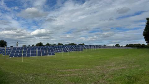 The same section with fixed module tables inserted on the meadow in front of the row of trees
