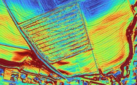 Digital terrain model of a project site in false colours with row-shaped terrain structures and contour lines